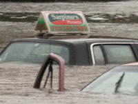 Pizza guy's car stuck in the water