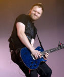 Ben Kasica of Skillet playing a solo at the Minneapolis Convention Center during their Awake and Alive tour