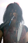 Korey Cooper of the band Skillet at her microphone