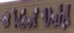Woofdah's logo on their new building