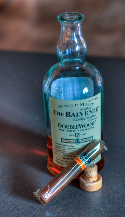 HDR image of a bottle of Balvenie Doublewood scotch and a Dominican Cohiba cigar