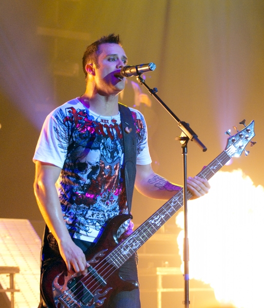 John Cooper of Skillet with fire