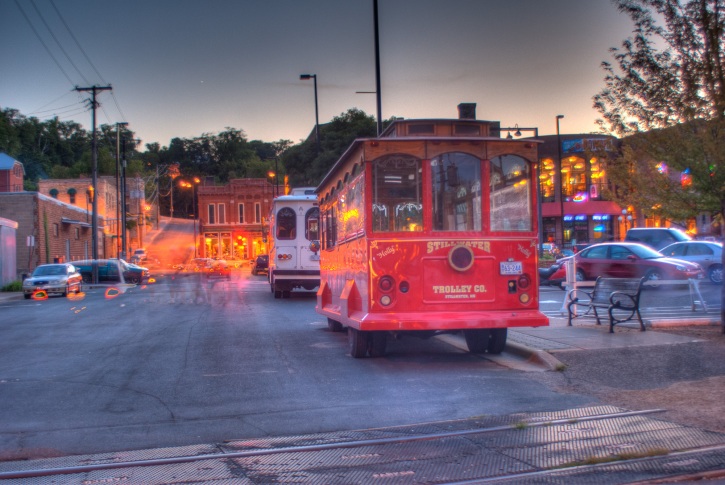 Unedited HDR version, from 9 exposures. Multiple cars and a group of people went through the scene while shooting - I haven't edited out the artifacts.. it's ugly! But still kind of a nifty picture.